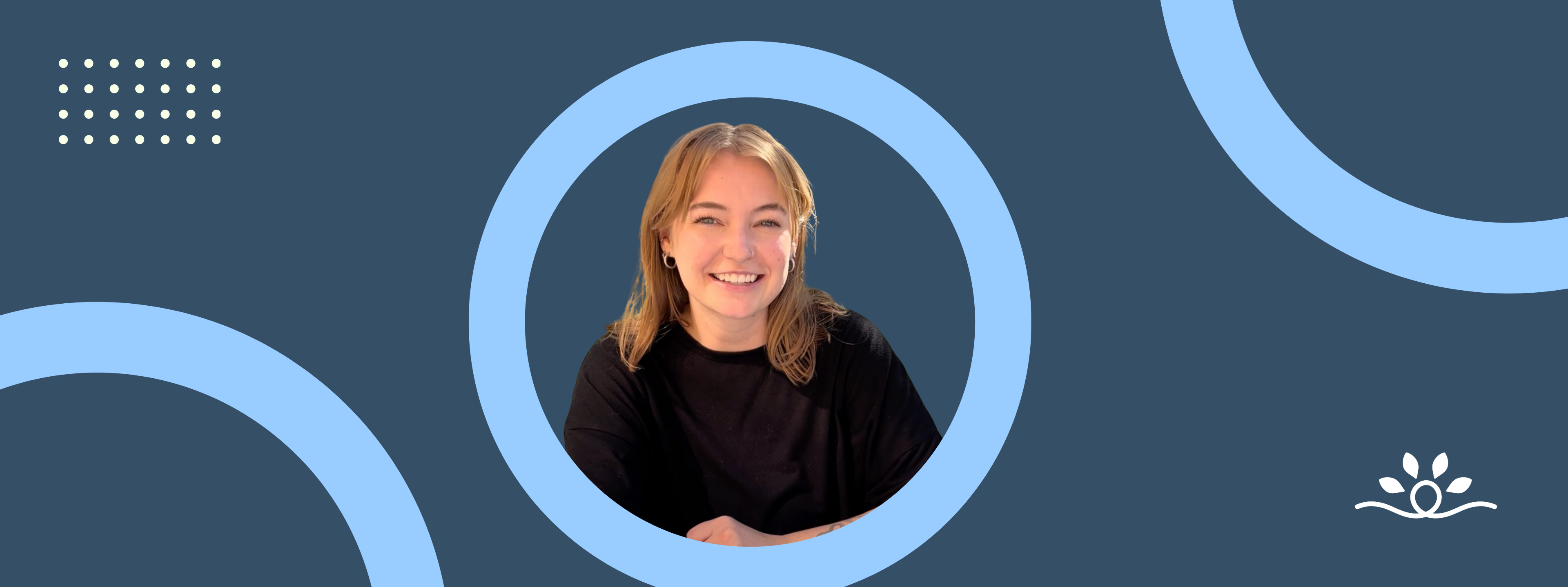 The banner graphic features a dark blue background, with various design elements. Two light blue circular shapes are present, one in the foreground framing the subject and the other partially in the background for visual balance. The subject, centered within a circular frame, is a person with light hair and a bright smile, wearing a black top. To the bottom right, the National Disability Center logo is visible, consisting of a white circular loop with four spear-shaped leaves arranged above it. A pattern of small, white dotted squares.